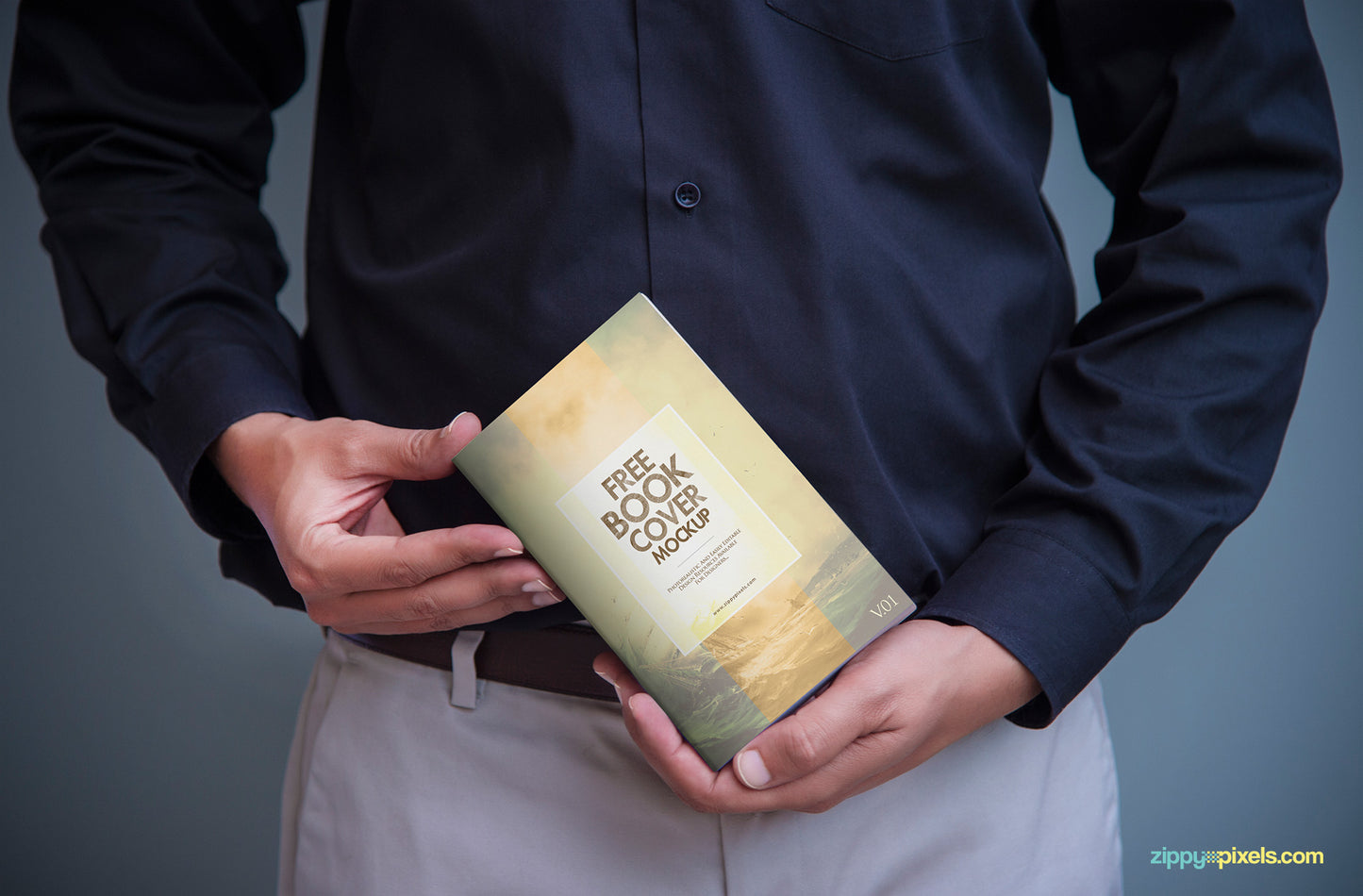 Free Book Cover Mock Up PSD in Mans Hand