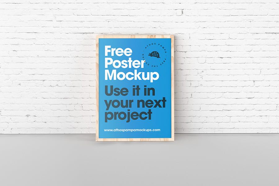 Free Solo Poster or Frame Mockup with Brick Wall