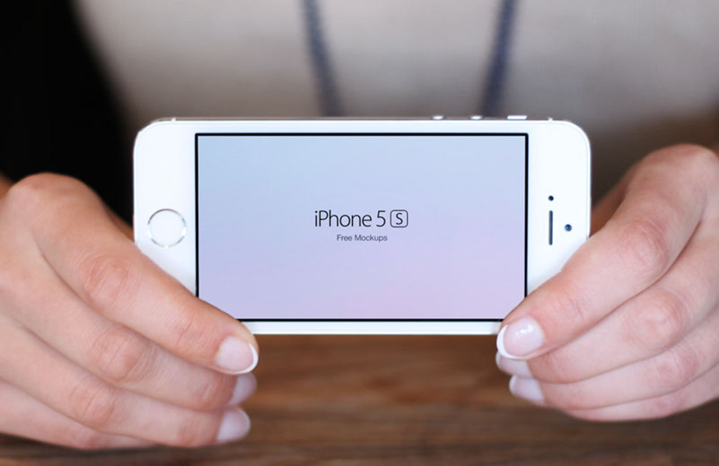 Free Set of iPhone 5S In Hand (Mockup)