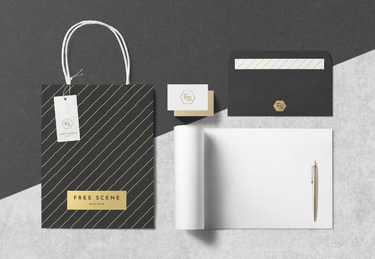 Free PSD Stationery Scene Mockup with Paper Bag and Pen