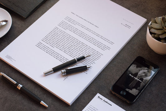 Free Letterhead Mockup in a Business Office Table
