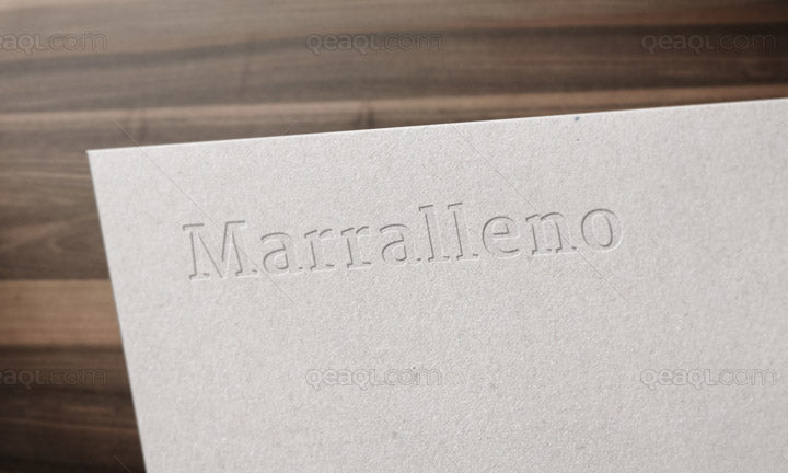 Free Logo Mockup with Textured Paper and Wood as Background