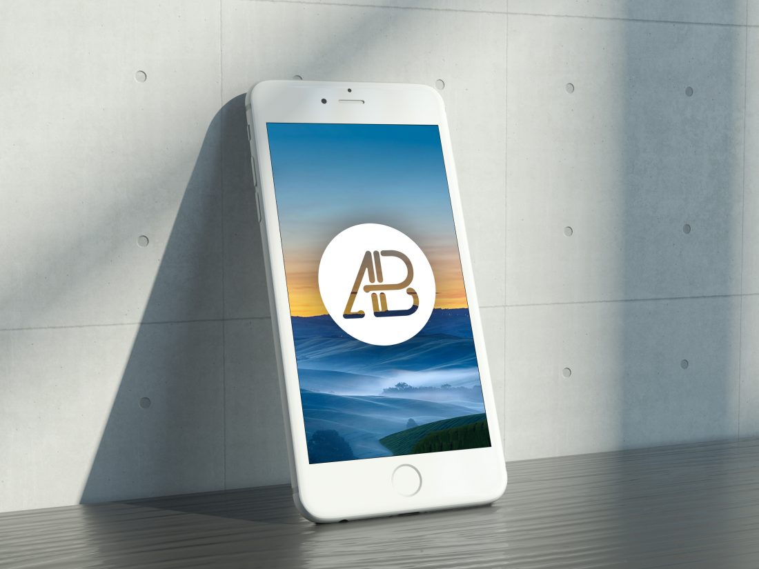Free Realistic iPhone 6s Mockup on the Wall