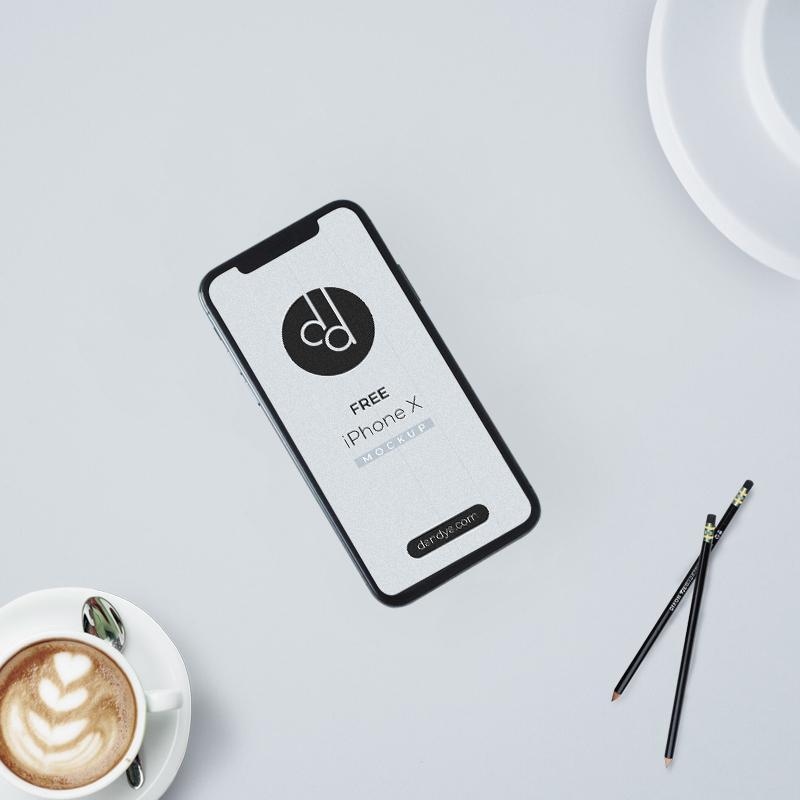 Free iPhone X Mockup with a Cappuccino Cup