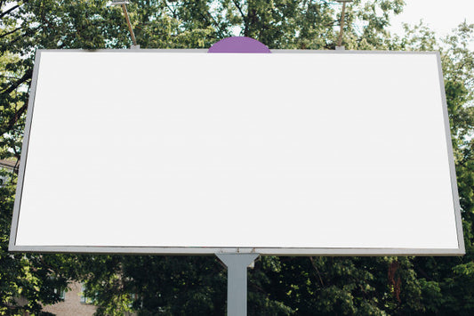 Free A Large Billboard With An Advertisement Picture On It In The Park On The Street Psd