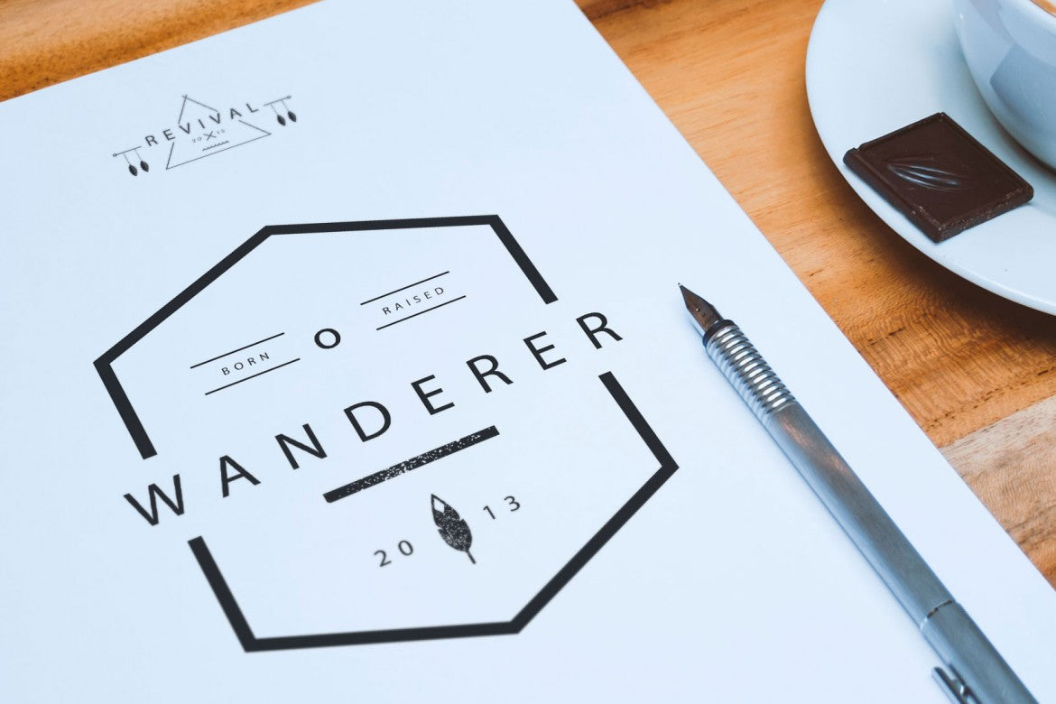 Free A4 Letterhead and Coffee Cup on Table (Mockup)