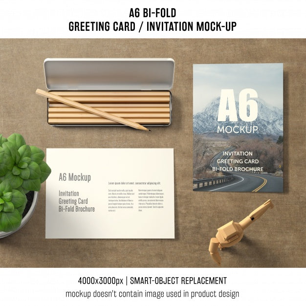 Free A6 Bi-Fold Greeting Card Mockup With Basil Psd