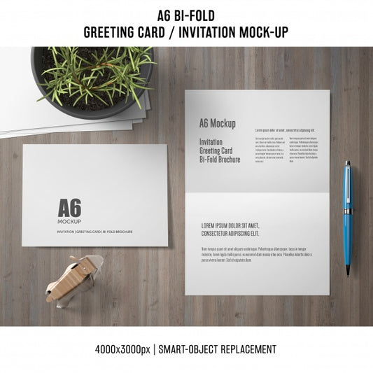 Free A6 Bi-Fold Greeting Card Mockup With Plant Psd