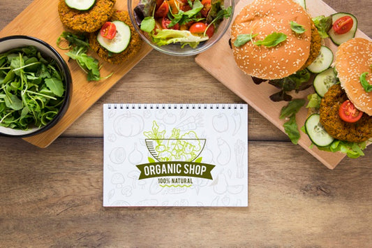 Free Above View Arrangement With Burgers And Notebook Psd
