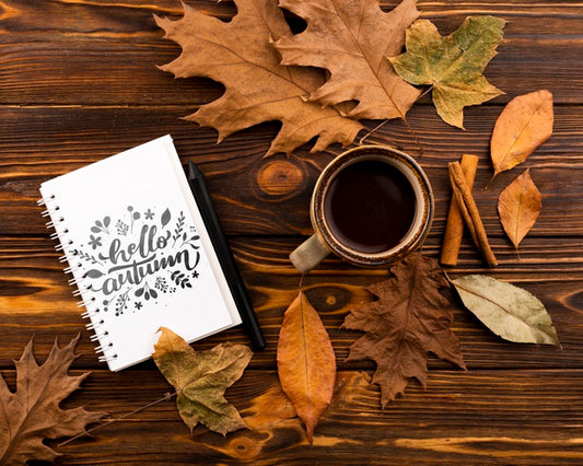 Free Above View Notebook And Coffee Cup On Wooden Background Psd