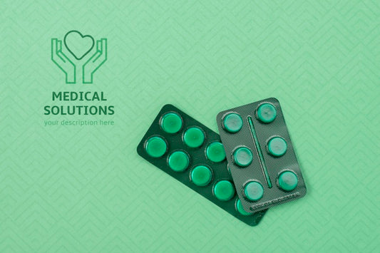 Free Above View Pills On Green Background Psd