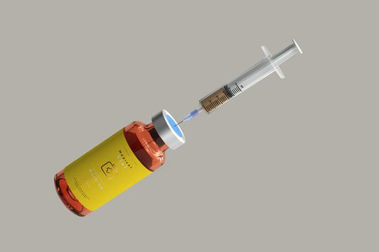 Free Amber Glass Vial Mockup With Syringe Psd