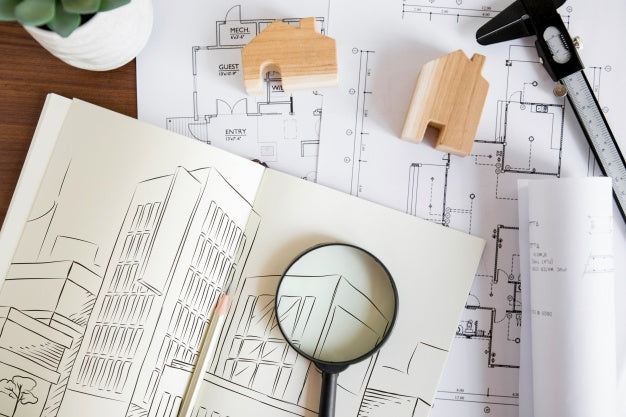 Free Architecture Composition With Paper Mockup And Magnifying Glass Psd