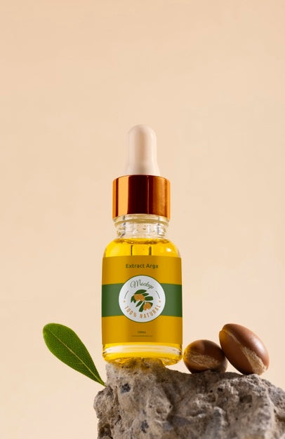 Free Argan Oil Cosmetic Bottle Mock-Up With Rock Psd
