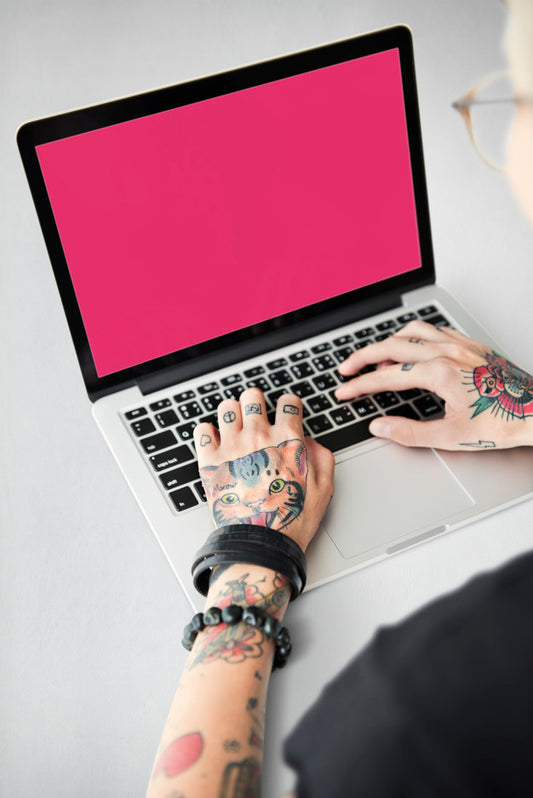 Free Arms With Tattoos Using Laptop Psd