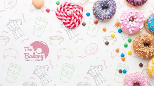 Free Arrangement Of Colorful Donuts And Sweets With Mock-Up Psd