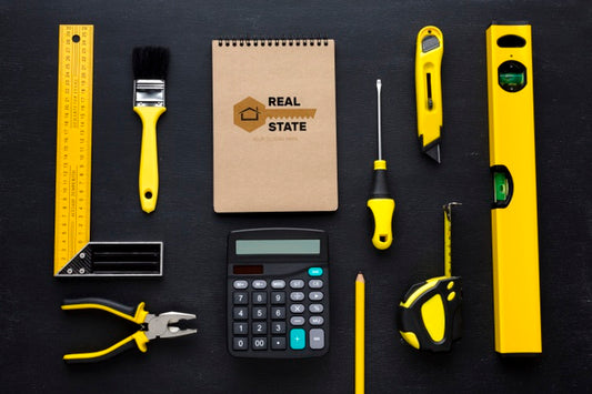 Free Arrangement Of Different Repairing Tools With Notepad Mock-Up On Black Background Psd