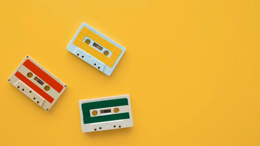 Free Arrangement Of Music Cassettes On Yellow Background Psd