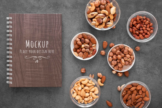 Free Arrangement Of Nuts With Notebook Mock-Up Psd