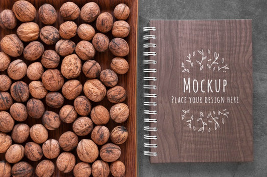 Free Arrangement Of Nuts With Notebook Mock-Up Psd