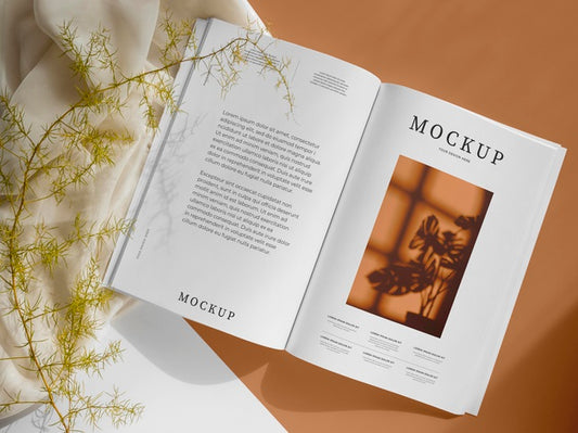 Free Arrangement With Magazine And Leaves Psd