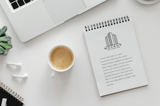 Free Arrangement With Mock-Up Notepad On A Desk Psd