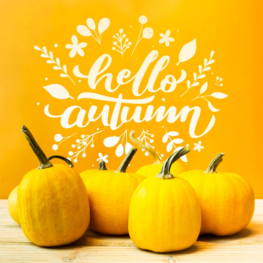 Free Arrangement With Pumpkins And Yellow Background Psd