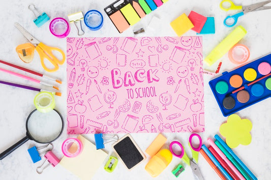 Free Arrangement With School Supplies Including Magnifying Glass Psd