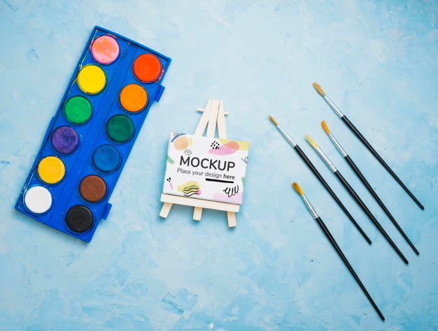 Free Artist Concept Assortment With Canvas Mock-Up And Watercolors Psd