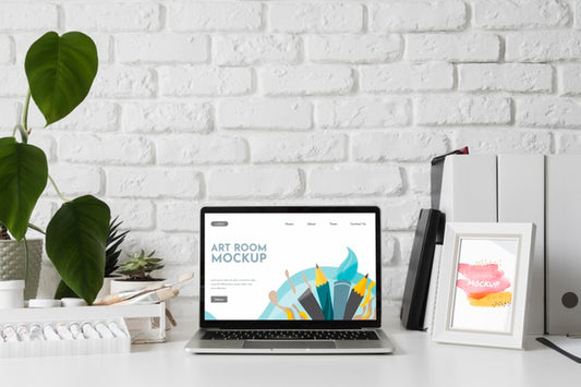 Free Artist Workplace Desk With Tools And Laptop Psd