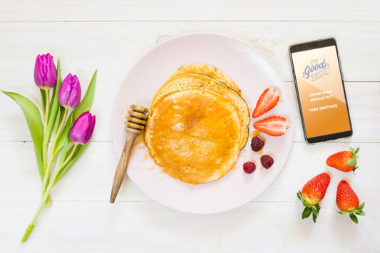 Free Assortment Of Breakfast Pancakes Next To Smartphone Psd