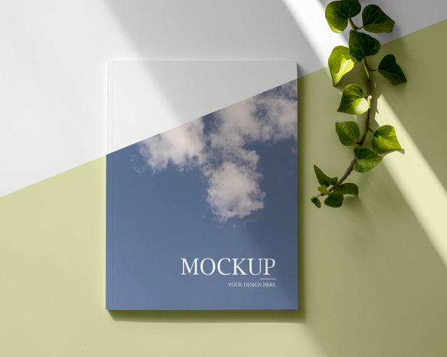 Free Assortment With Magazine And Leaves Top View Psd
