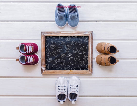 Free Baby Mockup With Four Pairs Of Shoes Psd