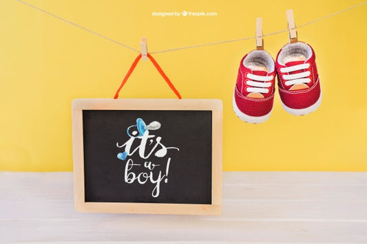 Free Baby Mockup With Shoes On Clothes Peg Psd