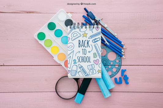 Free Back To School Composition With Notepad On Wooden Surface Psd