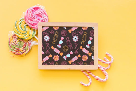 Free Back To School Composition With Slate And Sweets Psd