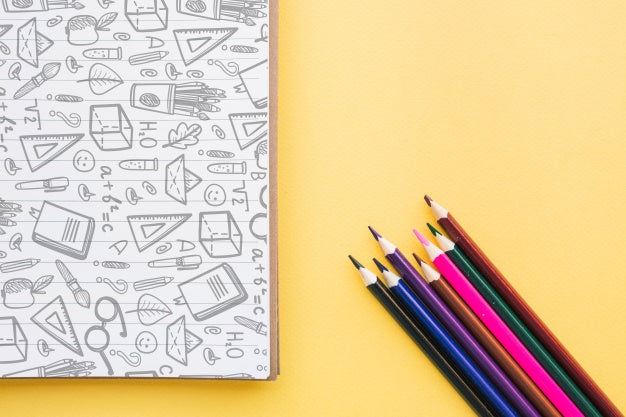 Free Back To School Mockup With Notebook Cover And Pencils Psd