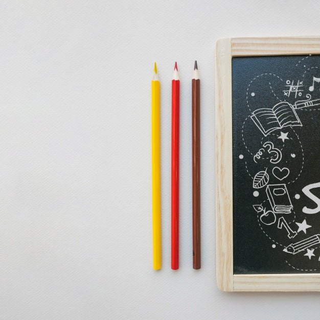 Free Back To School Mockup With Slate Next To Pencils Psd