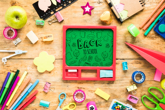 Free Back To School Supplies On Wooden Background Psd