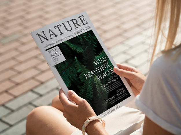 Free Back View Hands Holding Nature Magazine Mock Up Psd