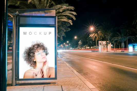 Free Billboard Mockup At Bus Stop At Night Psd