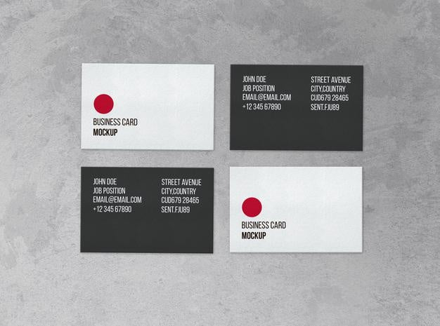 Free Black And White Business Card Collection Over Concrete Surface Psd
