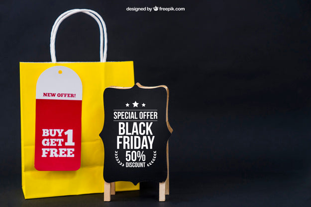 Free Black Friday Mockup With Board And Yellow Bag Psd