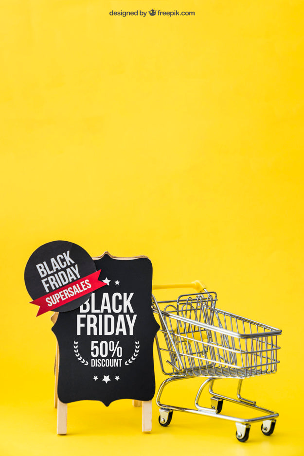 Free Black Friday Mockup With Shopping Cart Next To Board Psd