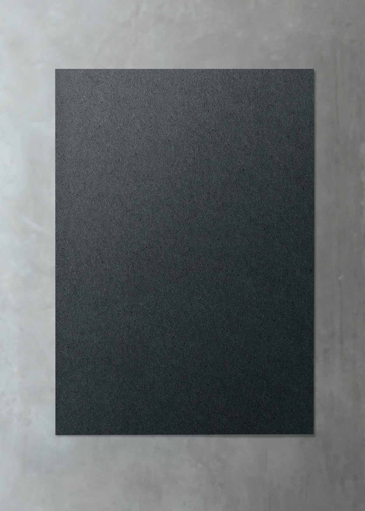 Free Black Paper On A Gray Marble Background
