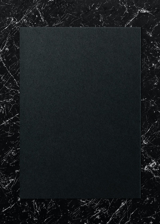Free Black Paper On A Marble Background