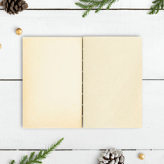 Free Blank Notebook On A Christmas Table Mockup Psd