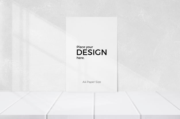 Free Blank Sheet Editable Template In Front Of White Wall Psd