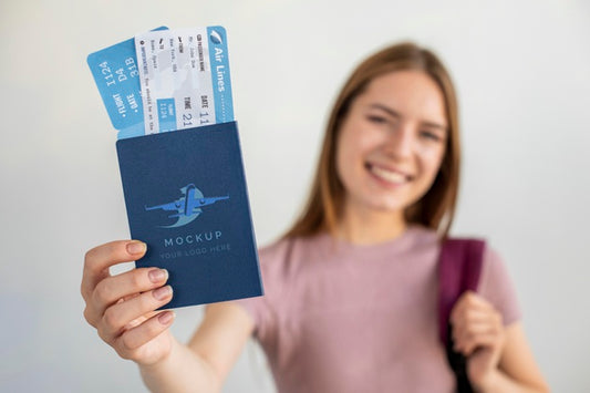 Free Blonde Woman With Passport Mock-Up Psd