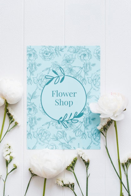 Free Blue Flower Shop Mock-Up And White Flowers Psd